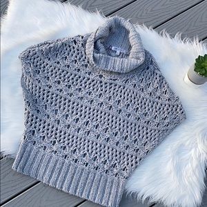 Jennifer Lopez grey cowl sweater vest